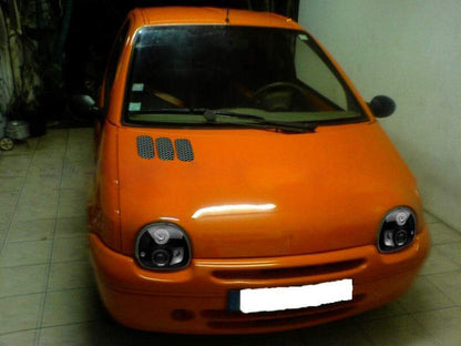 RENAULT TWINGO 1993-2007 FARI ANTERIORI NERI ANGEL EYES LENTICOLARI H1 / H1