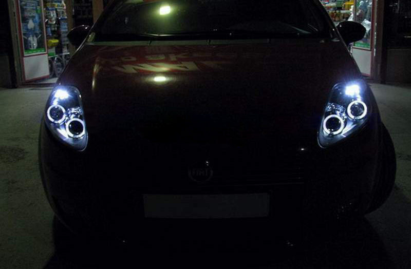 FIAT GRANDE PUNTO 2005-2008 FARI ANGEL EYES BIANCHI FANALI SPORTIVI CROMATI H1 / H1