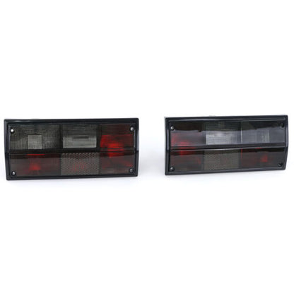 Coppia fanali posteriori nero fumè per VW Bus Box Transporter T3 79-92 AUTOELEGANCERICAMBI
