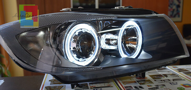 BMW SERIE 3 E90 E91 2005 - 2011 FARI NERI CON ANELLI ANGEL EYES LED BIANCHI AUTOELEGANCERICAMBI