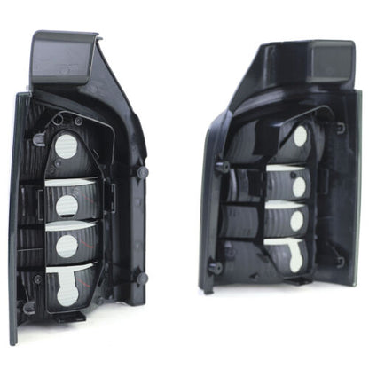 Coppia fanali posteriori in vetro trasparente nero fumé per VW Bus T5 03-09 con portellone AUTOELEGANCERICAMBI