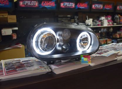 VW GOLF 4 IV DAL 1997 AL 2003 FARI ANTERIORI NERI CON ANGEL EYES BIANCHI A LED -