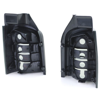 Coppia fanali posteriori in vetro trasparente nero fumé per VW Bus T5 03-09 con portellone AUTOELEGANCERICAMBI