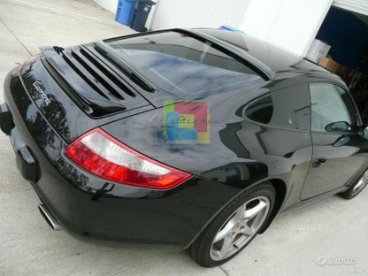 Porsche 911 996 rear spoiler on the hood