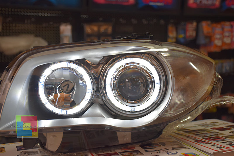 FARI SATINATI CON ANELLI ANGEL EYES LED BIANCHI BMW E81 E82 E87 E88 04-11