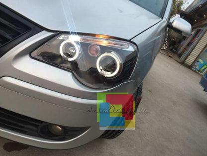 VW POLO 9N3 2005-2009 FARI ANTERIORI CROMATI ANGEL EYES LENTICOLARI H1 / H1