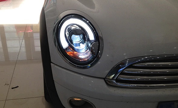 MINI COOPER R56 2006-2010 FARI ANTERIORI NERI ANGEL EYES D1S XENON DI SERIE