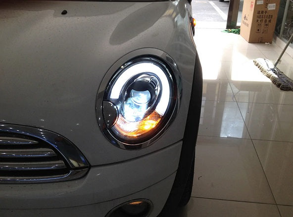 MINI COOPER R56 2006-2010 FARI ANTERIORI NERI ANGEL EYES D1S XENON DI SERIE