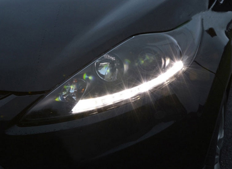 FORD FIESTA MK7 2008-2012 COPPIA FARI ANTERIORI NERI LENTICOLARI DIURNA LED