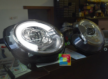 COPPIA FARI ANTERIORI LENTICOLARI MINI COOPER R55 R56 R57 DAL 2006+ DIURNE LED AUTOELEGANCERICAMBI