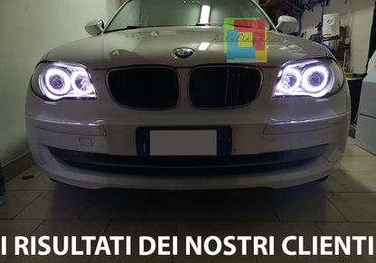 BMW SERIE 1 E81 E82 E87 E88 04-11 FARI NERI CON ANELLI ANGEL EYES LED BIANCHI AUTOELEGANCERICAMBI