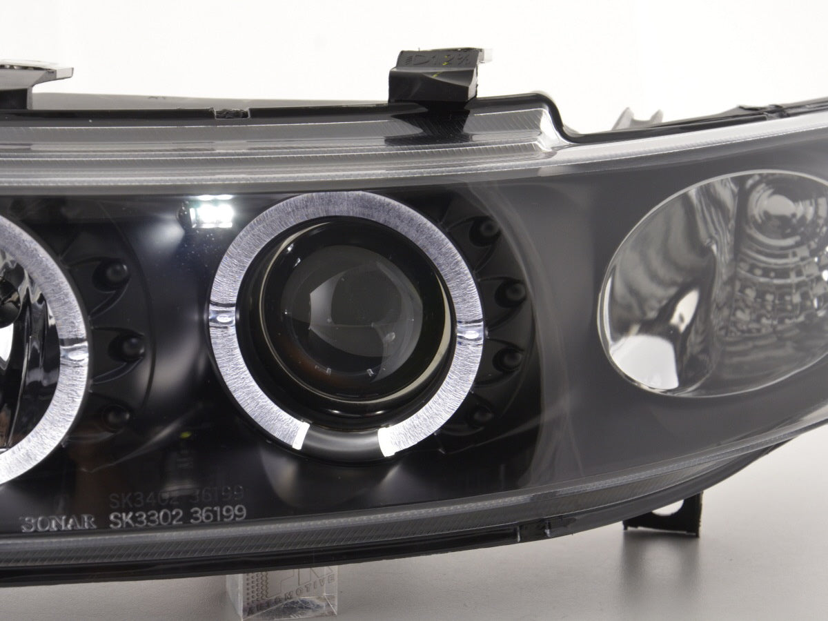 SEAT LEON 1999-2005 FARI ANTERIORI NERI ANGEL EYES LENTICOLARI H1 / H1