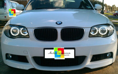 BMW SERIE 1 E81 E82 E87 E88 04-11 FARI NERI CON ANELLI ANGEL EYES LED BIANCHI AUTOELEGANCERICAMBI