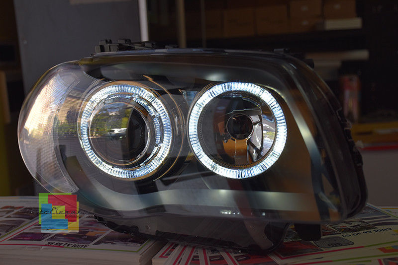 FARI NERI CON ANELLI ANGEL EYES BMW SERIE 1 E81 E82 E87 E88 04-11 LED BIANCHI