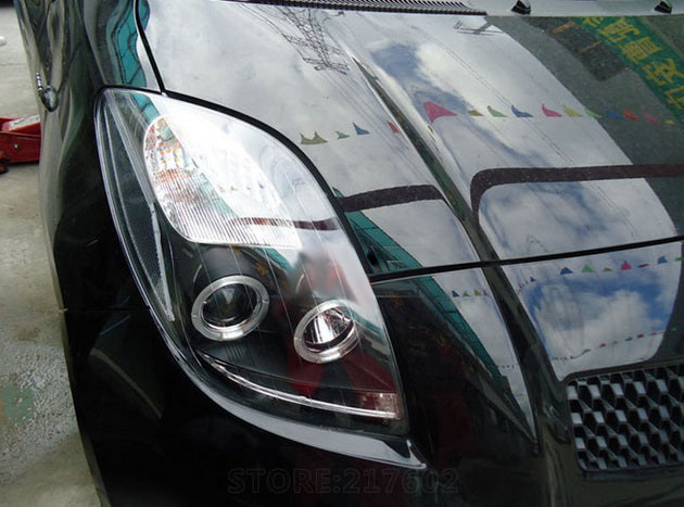 TOYOTA YARIS 2005-2009 FARI ANTERIORI NERI ANGEL EYES LENTICOLARI H1 / H1