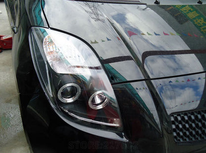 TOYOTA YARIS 2005-2009 FARI ANTERIORI NERI ANGEL EYES LENTICOLARI H1 / H1