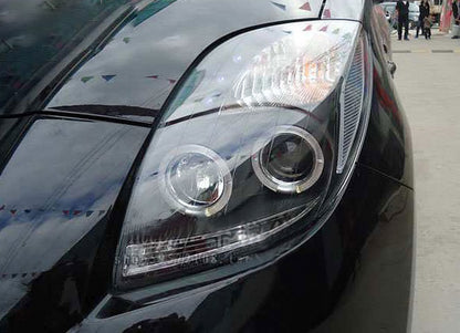 TOYOTA YARIS 2005-2009 FARI ANTERIORI NERI ANGEL EYES LENTICOLARI H1 / H1