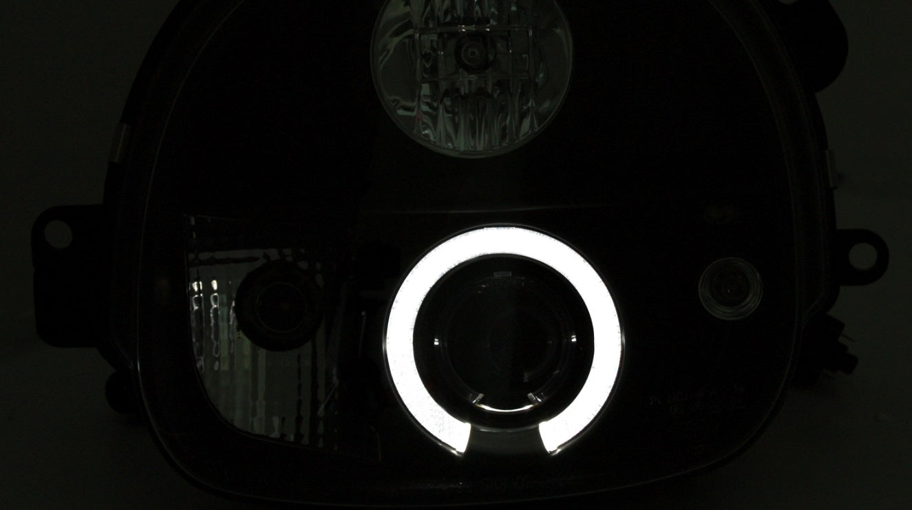 RENAULT TWINGO 1993-2007 FARI ANTERIORI NERI ANGEL EYES LENTICOLARI H1 / H1