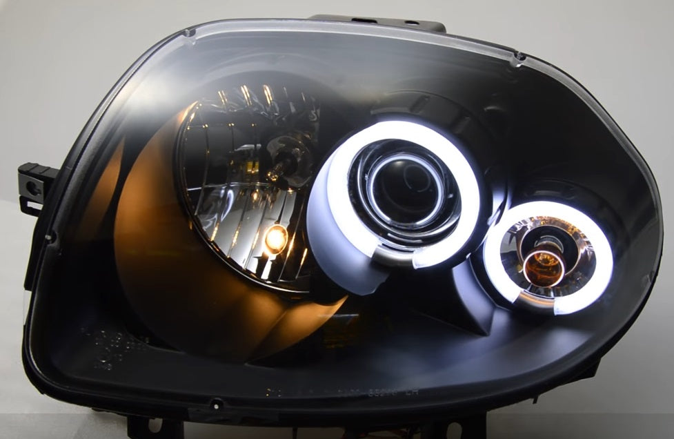 RENAULT CLIO 1998-2001 FARI ANTERIORI NERI ANGEL EYES LENTICOLARI H1 / H1