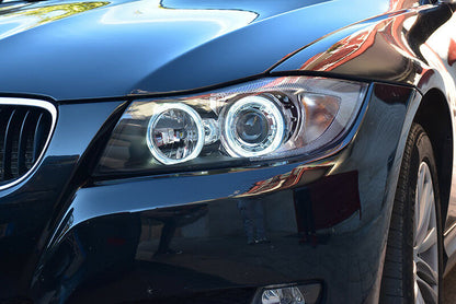 BMW SERIE 3 E90 E91 2004-2011 FARI NERI CON ANELLI ANGEL EYES LED BIANCHI -. AUTOELEGANCERICAMBI