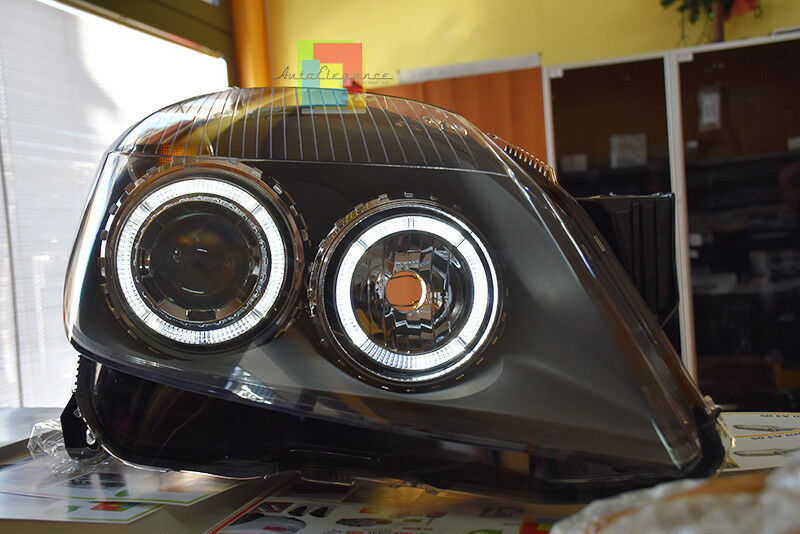 OPEL ASTRA H 2004-2007 FARI NERI CON ANELLI ANGEL EYES LED BIANCHI