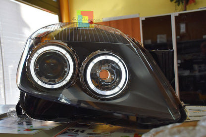 OPEL ASTRA H 2004-2007 FARI NERI CON ANELLI ANGEL EYES LED BIANCHI