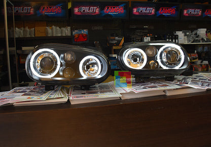 VW GOLF 4 1997 - 2003 FARI ANTERIORI NERI CON ANGEL EYES BIANCHI A LED