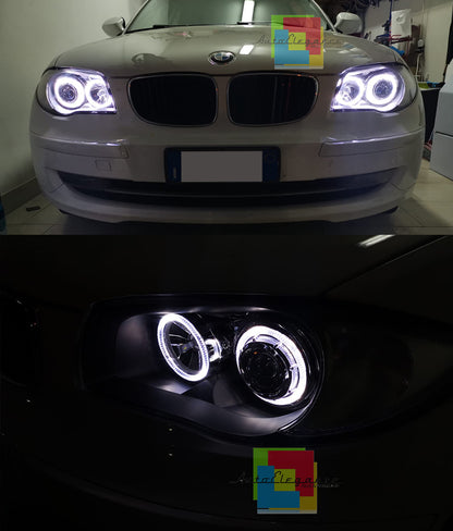 BMW SERIE 1 E81 E82 E87 E88 04-11 FARI NERI CON ANELLI ANGEL EYES LED BIANCHI AUTOELEGANCERICAMBI