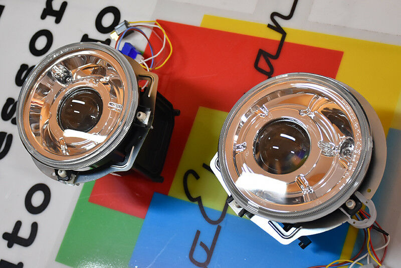 MERCEDES CLASSE G W463 W461 1990-2012 FARI ANTERIORI LENTICOLARI FANALI CROMATI