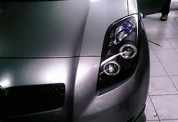 TOYOTA YARIS 2005-2009 FARI ANTERIORI NERI ANGEL EYES LENTICOLARI H1 / H1