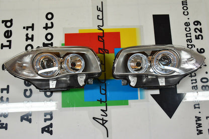 BMW E81 E82 E87 E88 2004-2011 FARI SATINATI CON ANELLI ANGEL EYES LED BIANCHI AUTOELEGANCERICAMBI